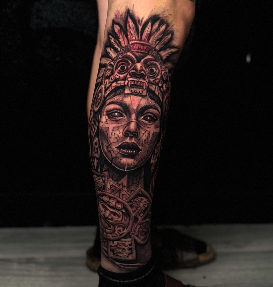 Black and grey Aztec warrior portrait forearm tattoo