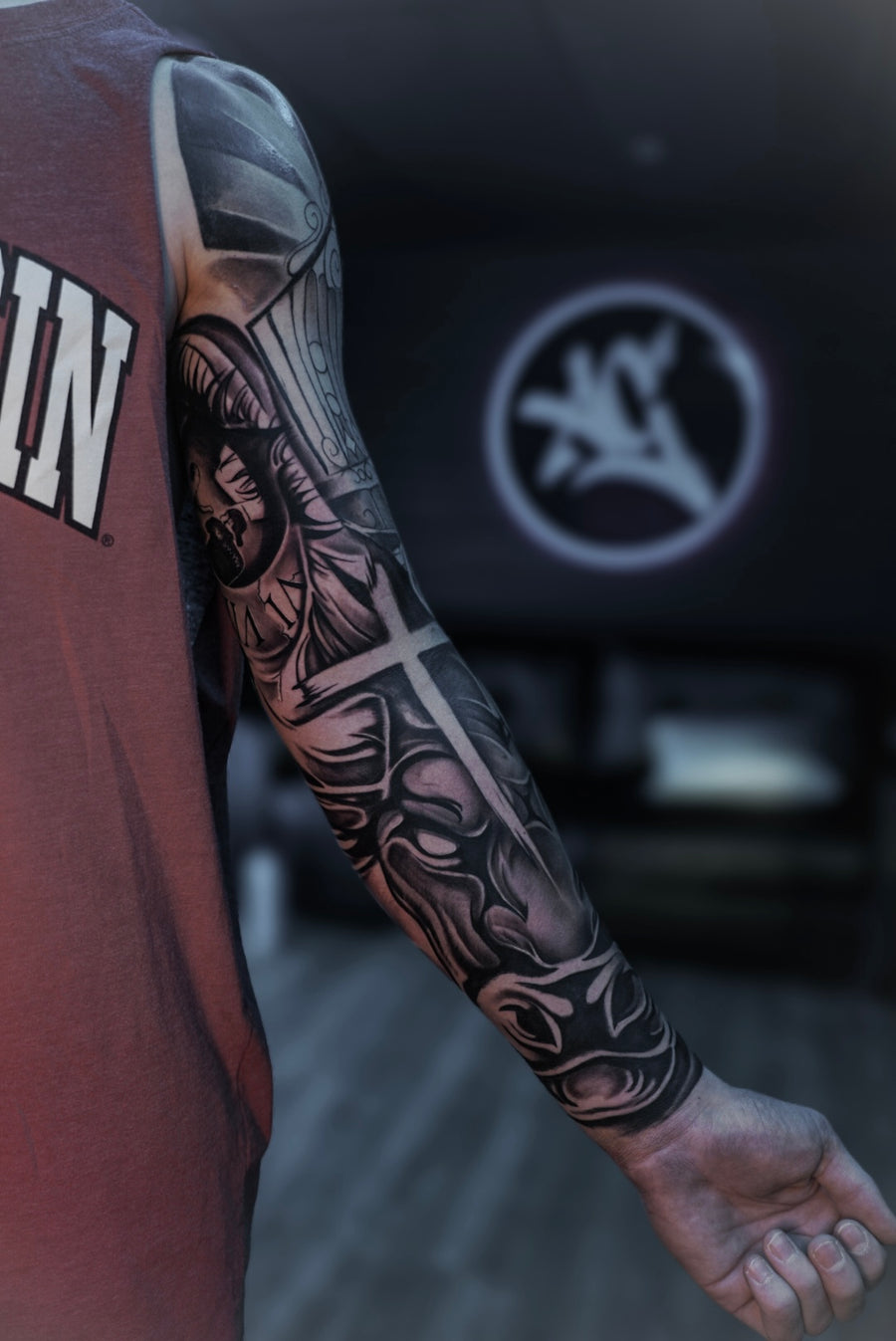 Black and grey religious sleeve with cross and praying hands
