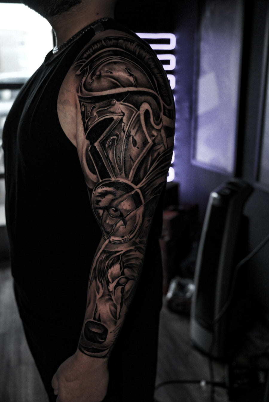 Black and grey warrior half sleeve done at Tagz Tattoo