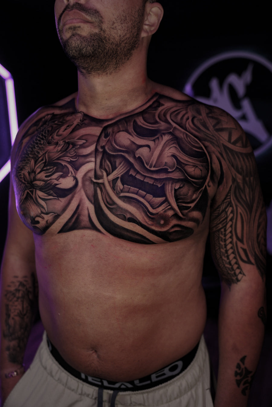 Black and grey chest panel tattoo done at Tagz Tattoo, Mesa AZ