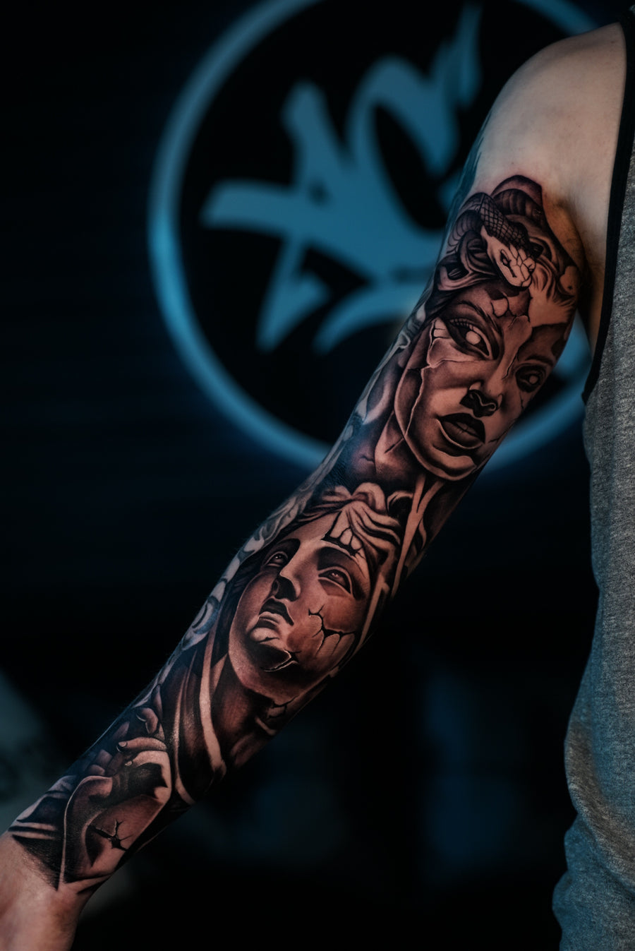 Black and grey realism portrait sleeve at the Tagz Tattoo studio in Mesa
