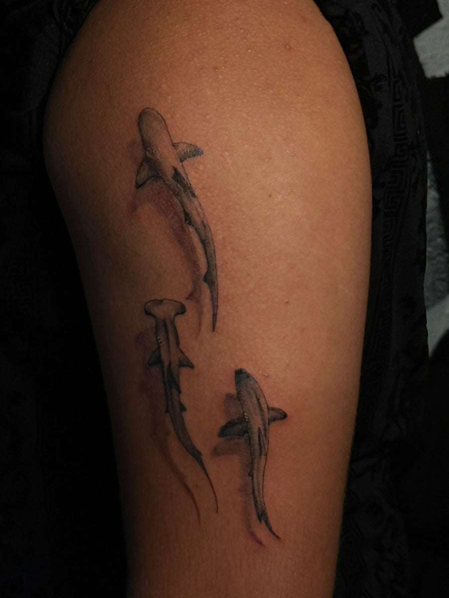 Fine line koi fish thigh tattoo