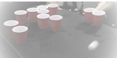Party cups on a table at a Tagz Tattoo VIP event